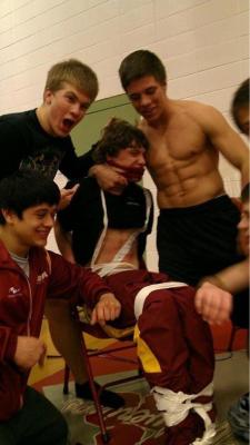 sexaulity:cosmic-noir:the-absolute-best-posts:fyeridan:“This a photograph taken from the teenager (shirtless guy) named Austin Schafer’s Twitter account, of a kid being tied up and beaten by upper classmen at Columbia High School in Nampa, Idaho. This