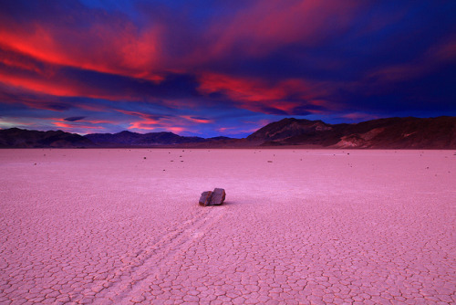 Sunset Over The Incredible Moving Rocks on The Racetrack Playa in Death Valley National Park Califor