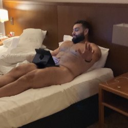 bearmythology:  Thanks to @d3str0n81 again, he told me how Rusev showed his fans how he would watch Game of Thrones while out on the road. Second image is the “enhanced” one, but I seem to still like the blurry original image. [source: instagram]