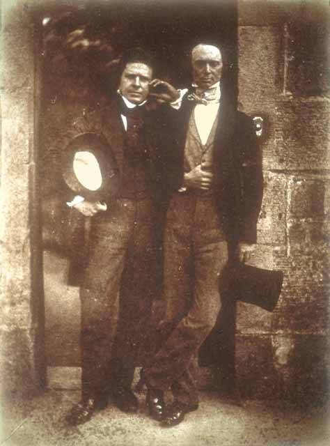 David Octavius Hill and William Borthwick Johnstone standing at the gate to his studio, Rock House, 