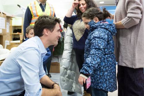 “To those fleeing persecution, terror and war, Canadians will welcome you, regardless of your 