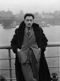 paxmachina:  Salvador Dali stands on the deck of the S.S. Normandie as it docks in New York City, December 7, 1936 