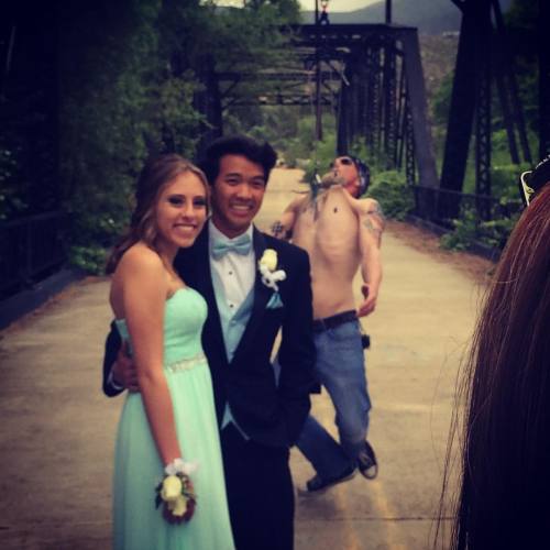 Sometimes worlds collide, and you get your prom picture photobombed by hookers on a bridge &hell