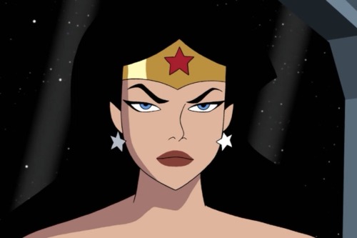 imsuggestingcoconutsmigrate:   pelosdegato:  ianthe:  Wonder Woman is having none of your shit today.  THat reflection is so fucking wrong…  Wonder Woman is so unimpressed her expression can go in two directions at once 