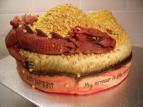 cupcakesandqwaffles:  My Smaug/Hobbit cake, titled ‘The Decoration of Smaug’ I finally finished the Smaug cake! After weeks of work, this is the finished product! I’m delighted with how it turned out, I’m glad I made the choice to hand-make all