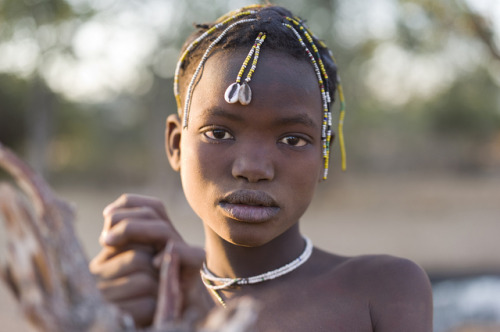 Mucawana women of AngolaMucawana women use cow dung and fat as well as beads to fashion their unique