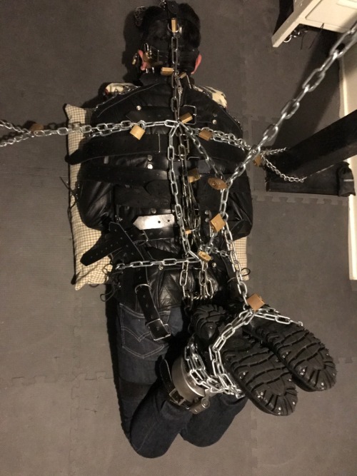 seabondagesadist: The “rest” for @lostinsea88 didn’t last all that long before I decided that it was simply not enough bondage and needed correction. A modified straightjacket hogtie was called for.  His legs pulled up and locked to chains around