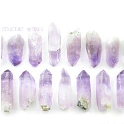 structureminerals:  Amethyst crystals from