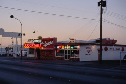 vintagelasvegas: Fremont St, Las Vegas, 1997.  Atomic Liquors and motel signs, not much changed in 20 years. Photos by Valentin Wuebben. 