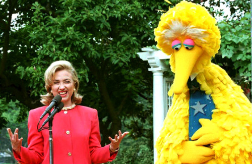 toughpigs:Hillary Clinton and Sesame Street’s Big Bird, Oscar, and Rosita.