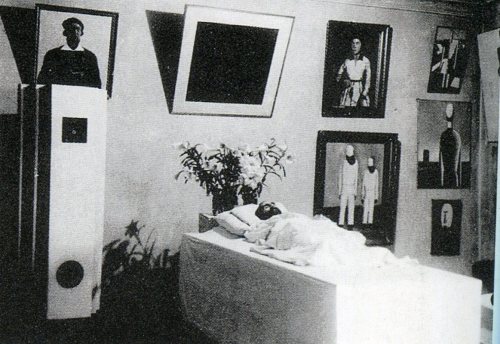 Malevich in his deathbed, surrounded by his works (1935)