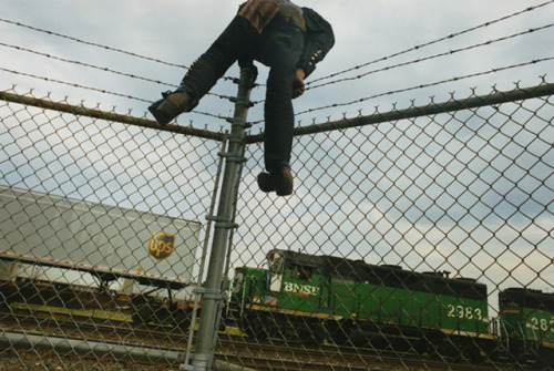 rishu-jpn:  A Period of Juvenile Prosperity - Mike Brodie 10 years. 80,000 km travel distance.46 states. 170 Freight train.Encounter with countless fellow. 