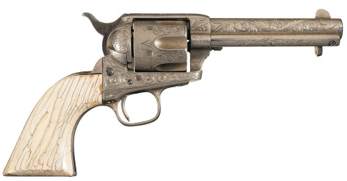 Model 1873 Colt Single Action Army revolver with knife and hip flask belonging to old west gunfighte