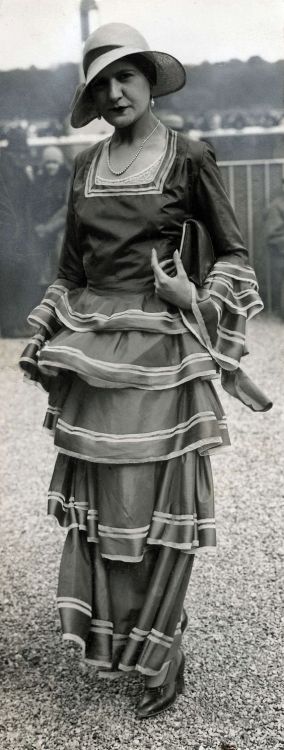 A woman at Longchamp Racecourse in France, 1930.