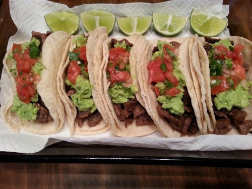 mexicanfoodporn:  En hilerita.  rhps2000:  Carne asada tacos with guacamole and pico de gallo  