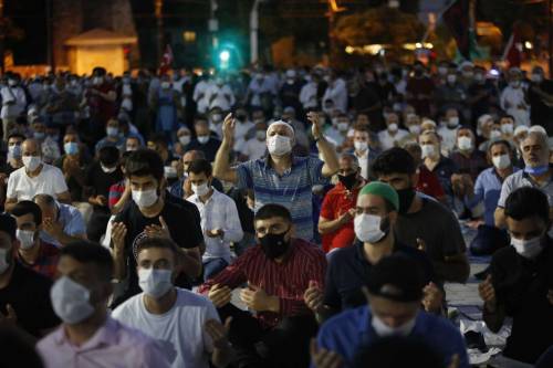 Muslims gather for evening prayers outside Hagia Sophia on Jul 10, 2020  after Turkey&rsquo