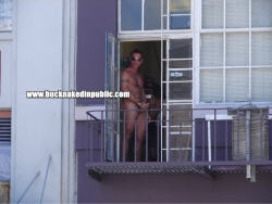 mitchhightower:  Furry hunk RANDY HUNT jacks off while naked on the fire escape at the BNIP HQ in downtown SAN FRANCISCO on a weekend afternooon.  http://www.bucknakedinpublic.com