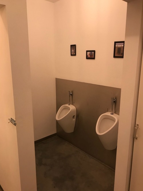 unisex restroom at a local restaurant in lebbeke. The sink is for both men and woman and is in the s