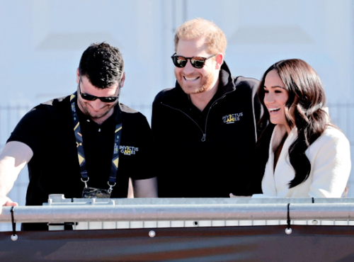 The Duke and Duchess of Sussex greet paralympian Dave Henson at the Invictus Games athletics events 