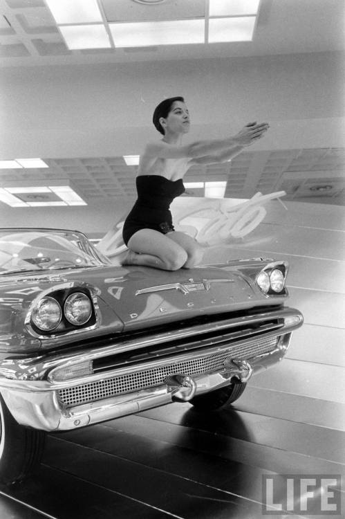 Jean Littleton on a Desoto at the auto show(William Sanders. 1956?)