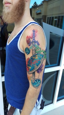 gamerink:    Awesome Master Sword and Hylian Shield tattoo done by @jonotattoos.  