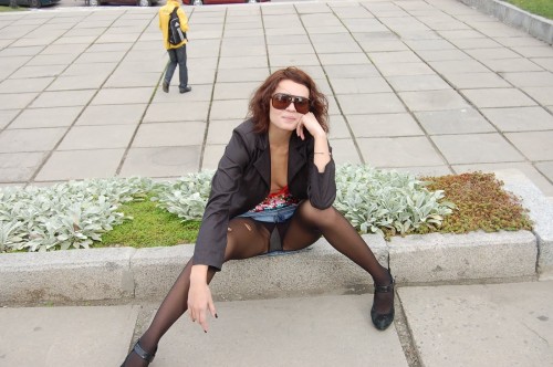 Sexy wife flashing black pantyhose in the street.Woman in pantyhose