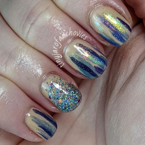 This is a manicure I created using @kbshimmer polishes. I wore it on ~my other hand~ when I recently