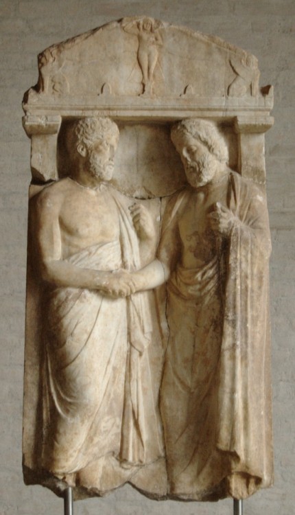 Inscribed Attic funeral stele for a man named Artemon.  Artemon is shown shaking the hand of an olde