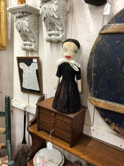 shiftythrifting:Some VERY haunted dolls in an antique shop in vermont -WHY IS THE BABY IN A BOTTLE I