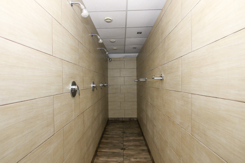 Men’s shower room at Das aktuelle Fitnessstudio, Bielefeld, Germany. Looks like a very narrow 