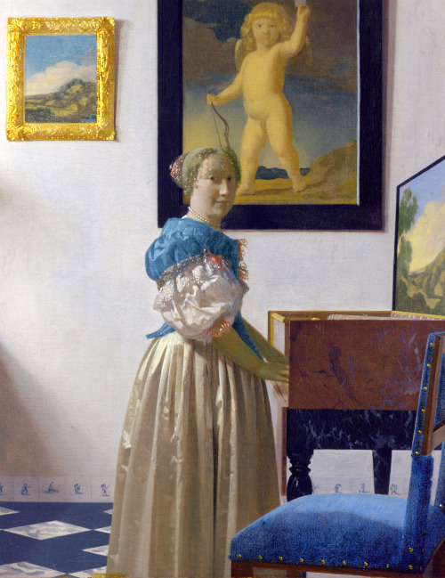  Lady standing at a virginal by Johannes Vermeer, 1670-1672
