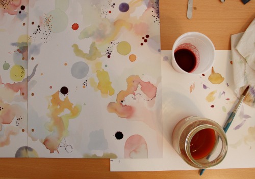 Painting with red and yellow onion skin, beetroot, red cabbage and blueberries.