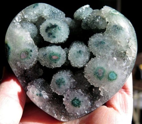geologyin-blog: Unusual Natural Green Amethyst Heart with a polished face. Brazil Photo: Golden Hour