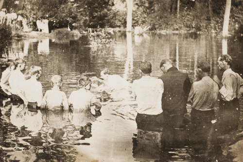 Unidentified photographersRiver Baptisms, c. 1880-1930.These outdoor communal rites were public disp