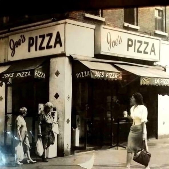 Posted @withregram • @retronyc Joe&rsquo;s pizza Bleecker Street and 6th Avenue photo credit : Pino &lsquo;Joe &rsquo; Pozzuoli ,1975#retronyc #nyc #vintage #vintagenyc #retro #nyceats #nycphotographer #nycfashionblogger #nycarchitecture  #nycrestaurants