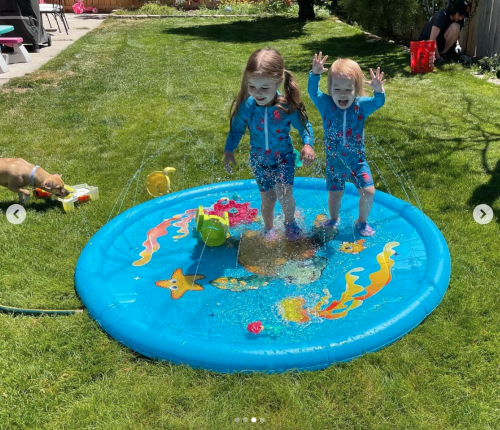 Splash pad fun! I knew Lily would absolutely go nuts for it; although she got to sit in it last summ