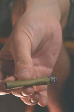 smokepotwithme:  steve passin me a blunt on my dash 