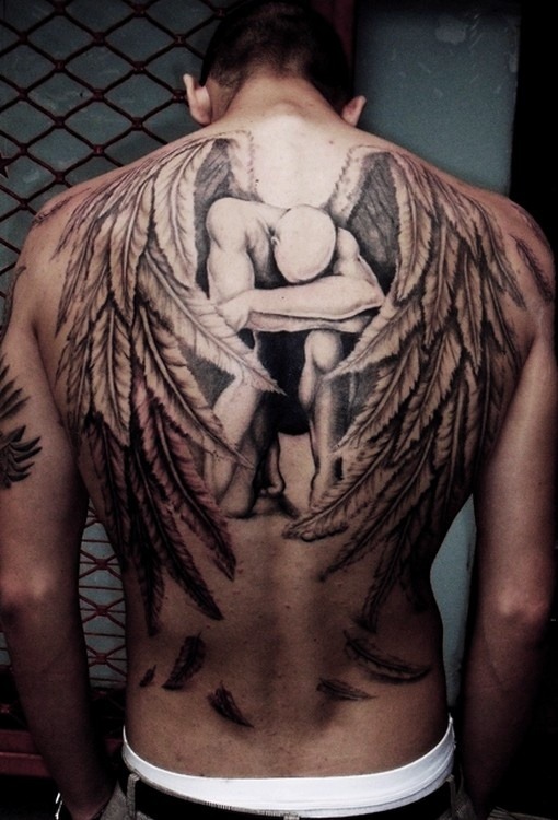 thepaintedbench:  Kneeling Angel Back Tattoo