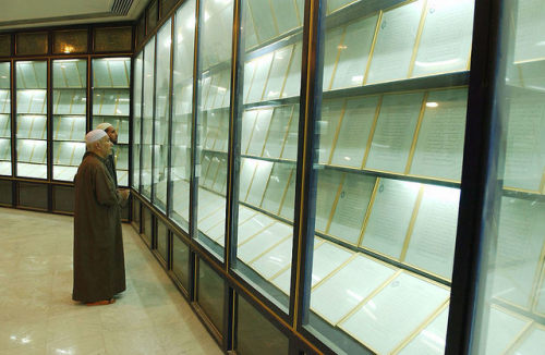 Iraqi Imams view the 605-page Quran written using 24 liters of Saddam Hussein’s own blood dona