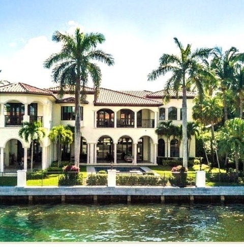 Miami RoofingIdeas For A Substantial, Traditional, Two-story Stucco Home With A Hip Roof And A Tile Roof