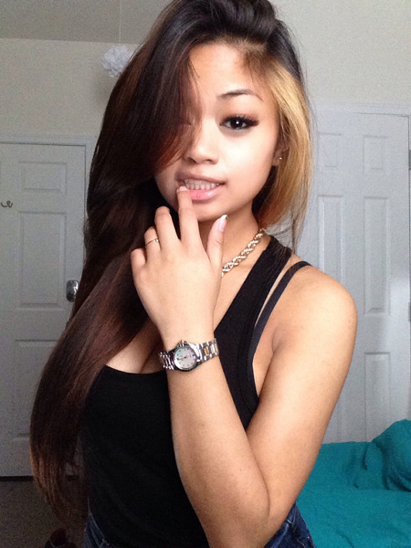 piaddicts:  Sexy Filipina teen beauty with blonde frosted hair wearing a black dress