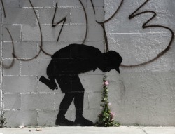 10   3leapfrogs: junkculture:  A new Bansky mural spotted in Los Angeles.   •=• •=• •=•