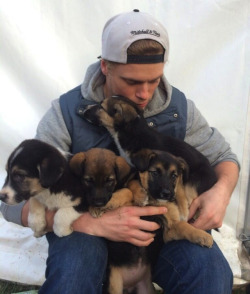 oceaniceyes:   thefourthandfrattiest:  awwww-cute:  US Olympian finds stray puppies in Sochi  He actually RESCUED those four stray puppies and is trying to get permission to bring them back to the US.  This is AWESOME because a lot of strays there got
