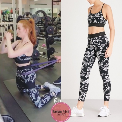 Instagram Story.Madelaine wore the Koral ‘Sweeper Bra - Black Camo/Black‘ ($75) and the 