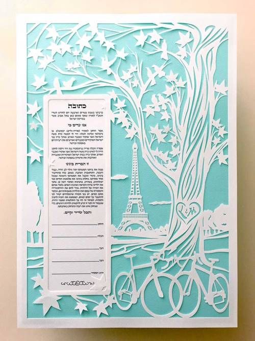 I made this papercut ketubah featuring the beautiful city of Paris with a view of the Eiffel Tower. 