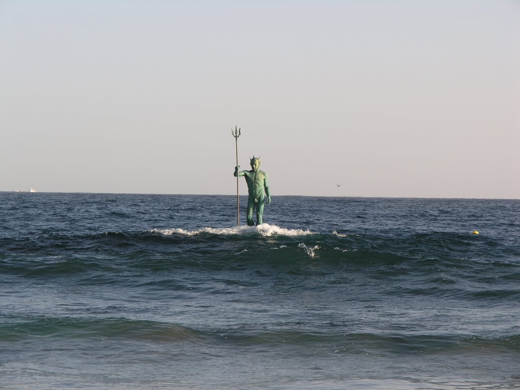emotionxcaptured:  A wave engulfs the statue of Neptune on Melenara Beach, Gran Canaria.