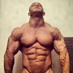 keepemgrowin:  Muscle god, looking up to the heavens. 