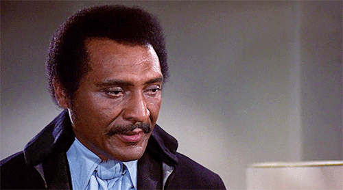 talesfromthecrypts: I’m standing in front of Pan American, and the driver can’t miss me, cause I’m that evil. William Marshall in Blacula (1972)Duane Jones and Marlene Clark in Ganja and Hess (1973)Grace Jones in Vamp (1986)Cynthia Bond in Def by