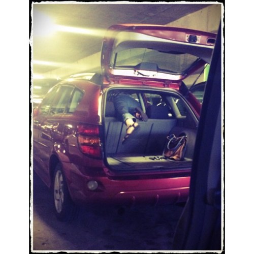 <p>Most of you know that we hosted a 70th birthday party for my mom earlier this month. Here’s a photo of her breaking into my car using the hatchback because @lukeplusrach (trying to be smart and helpful) locked the doors and left the keys inside when he dropped my car at the airport. Which would have been fine except I didn’t read his text that carefully and didn’t bring an extra set of keys. But my nimble 70 year old mother saved the day and here’s proof. #mymomrocks #firstworldproblems #parkinggarage #earlyflight #fiddlestar  (at Nashville International Airport)</p>