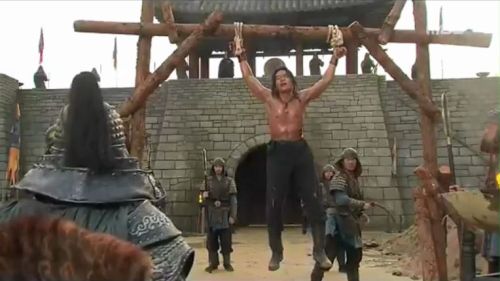 Gyebaek E10 part 1 of 2 In this Korean historical drama, a muscular young man is publicly flogged an